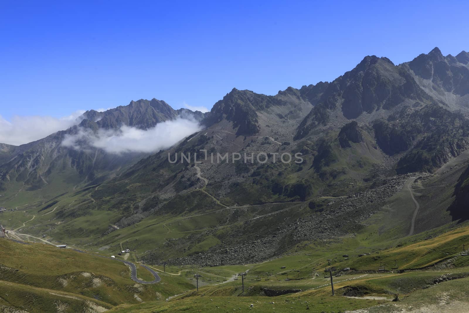 Landscape in Pyrenees Mountains as it could be seen from Col du Tourmalet.You can see segments of the road to this point, which is one of the most famous cycling climbing route in the world.