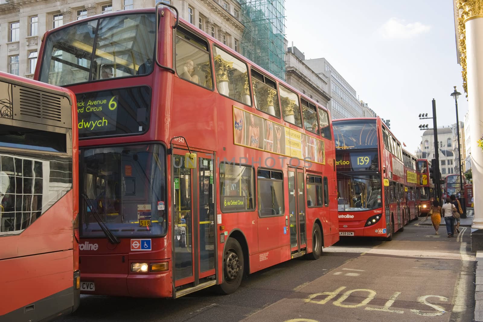 Red two-storeyed buses - one of symbols of London 