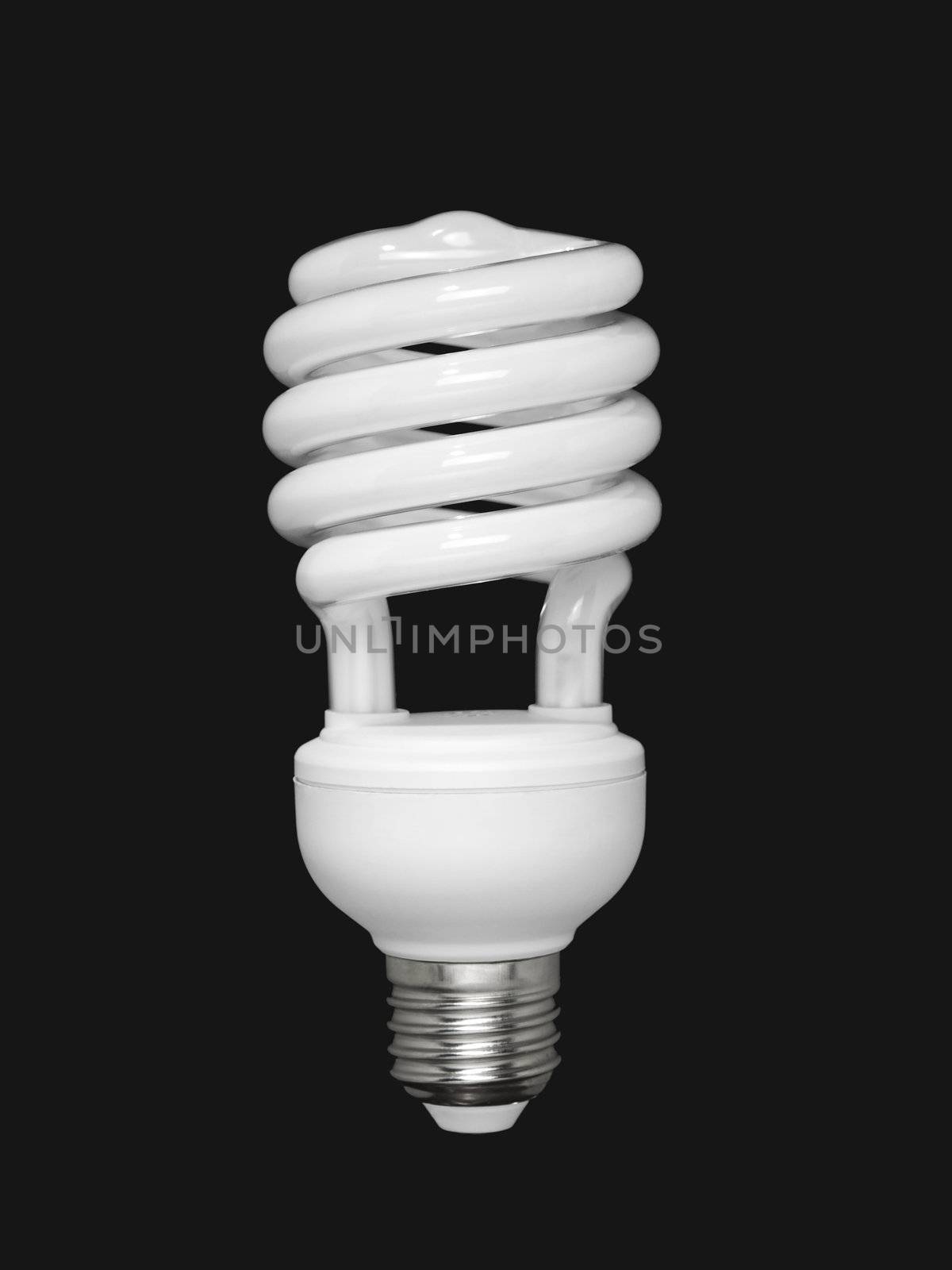 Compact fluorescent light bulb isolated over black background.
