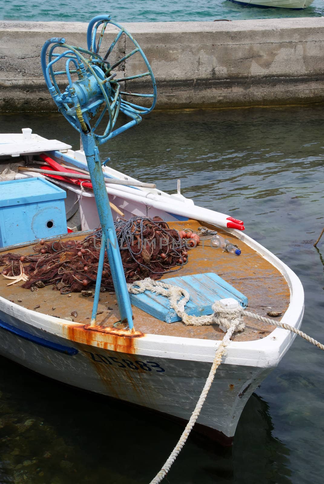 Colorful boat on with the traces of age.