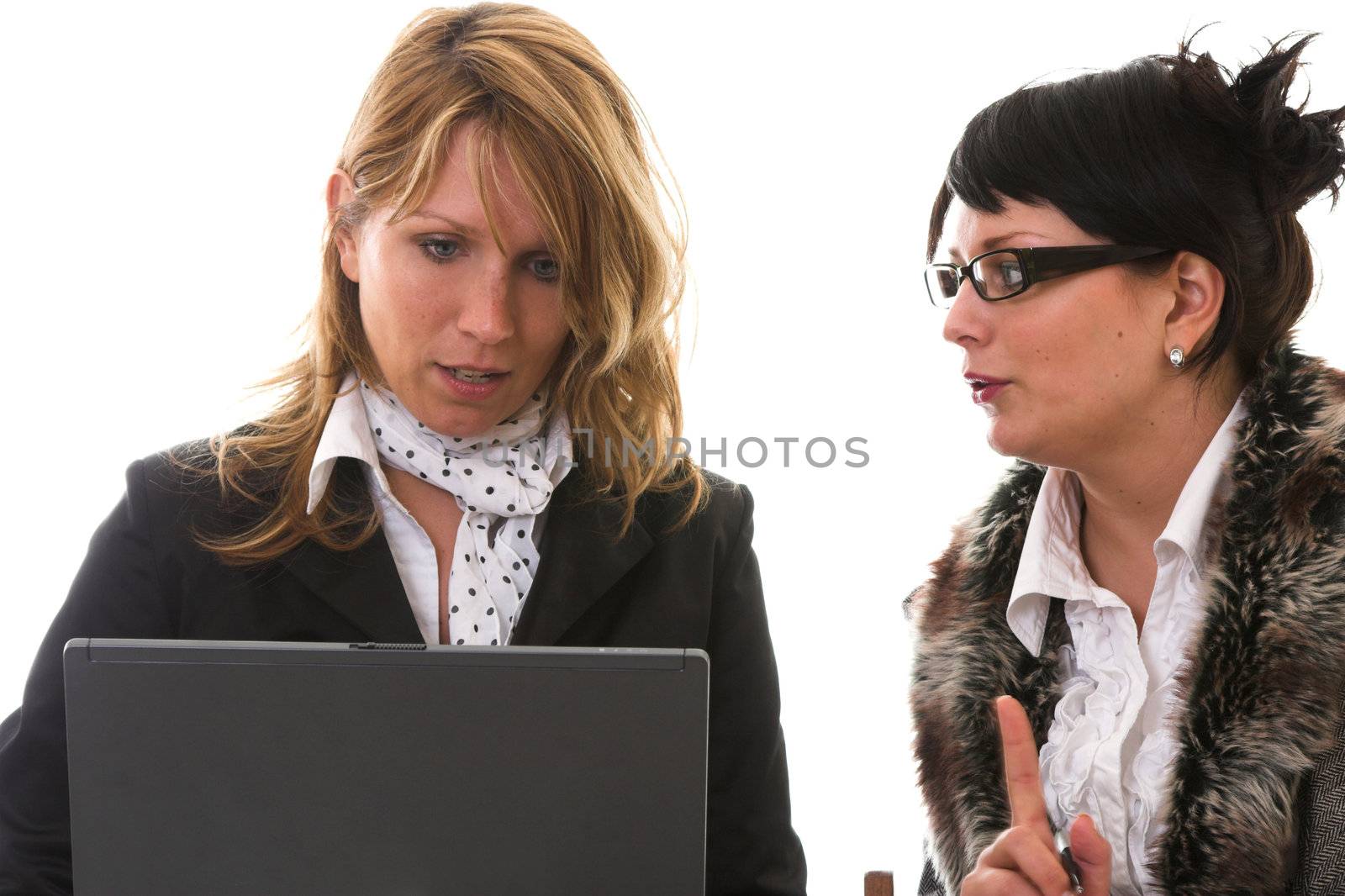 Two business women sitting together and having a meeting