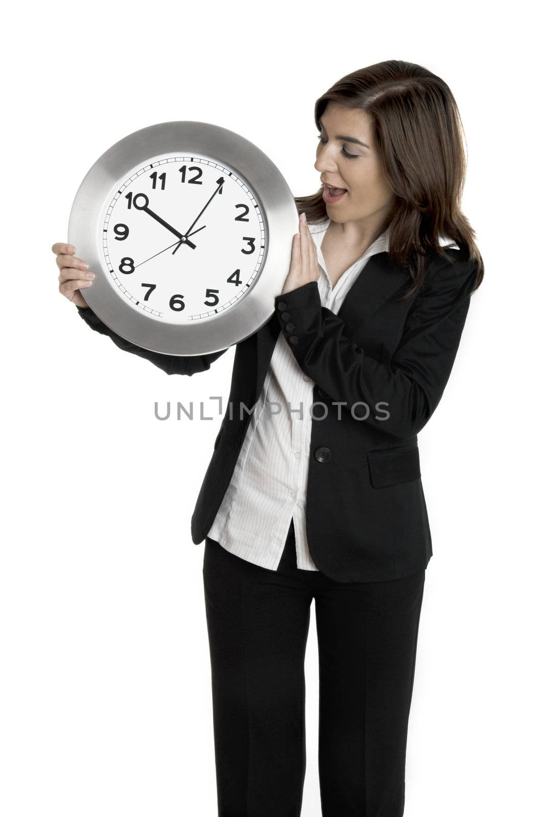 Happy business holding a clock isolated on white 