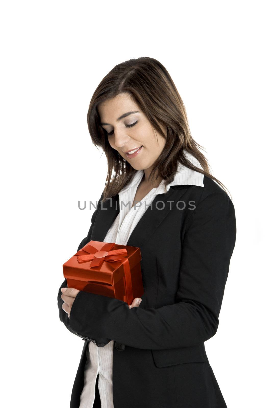 Beautiful bussiness woman holding a gift isolated on white
