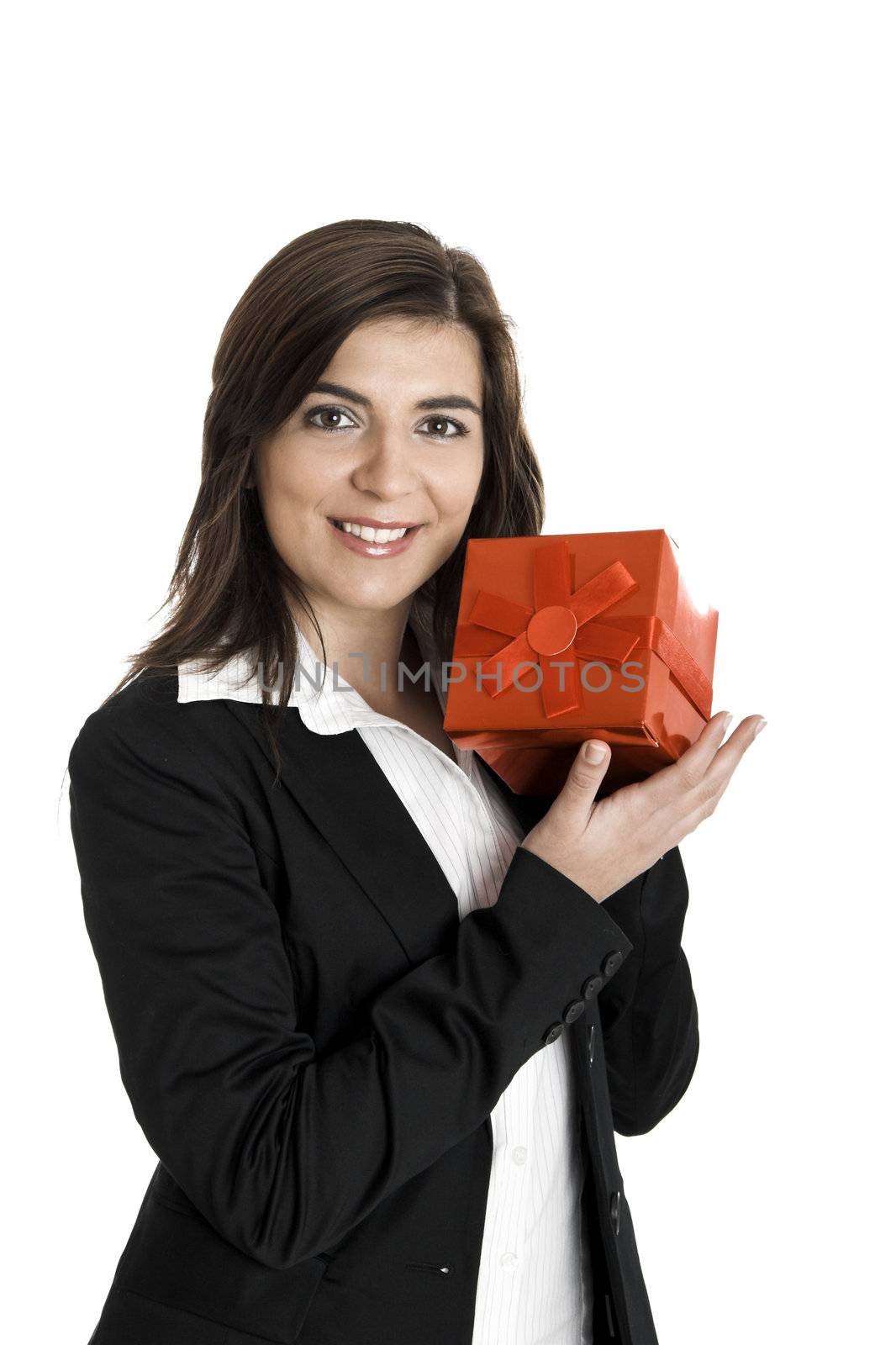 Beautiful bussiness woman holding a gift isolated on white