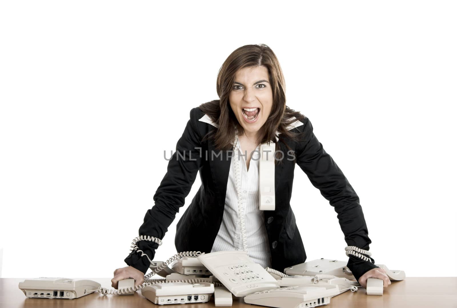 Busy woman working and answering a lot of calls at the same time