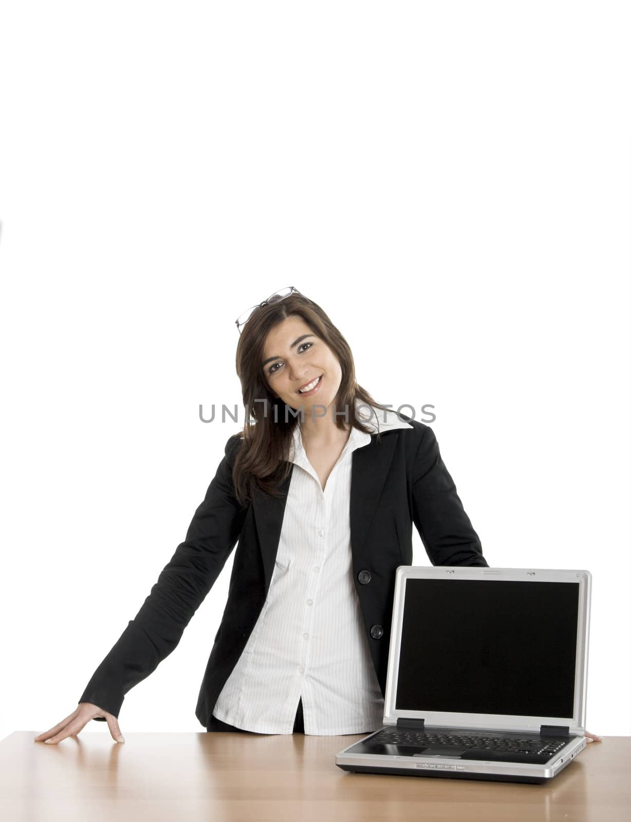 Beautiful business woman showing a presentation on the laptop 