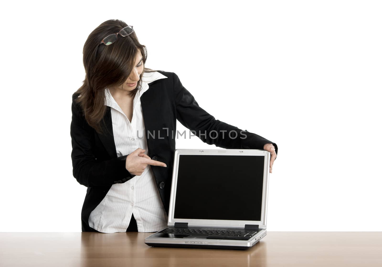 Beautiful business woman showing a presentation on the laptop 