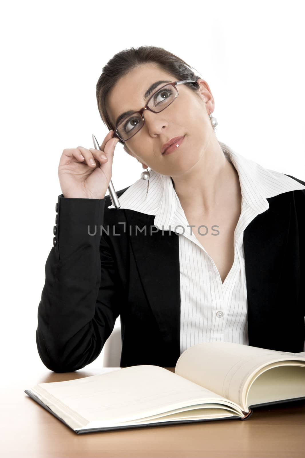 Beautiful business woman thinking in something out of the work