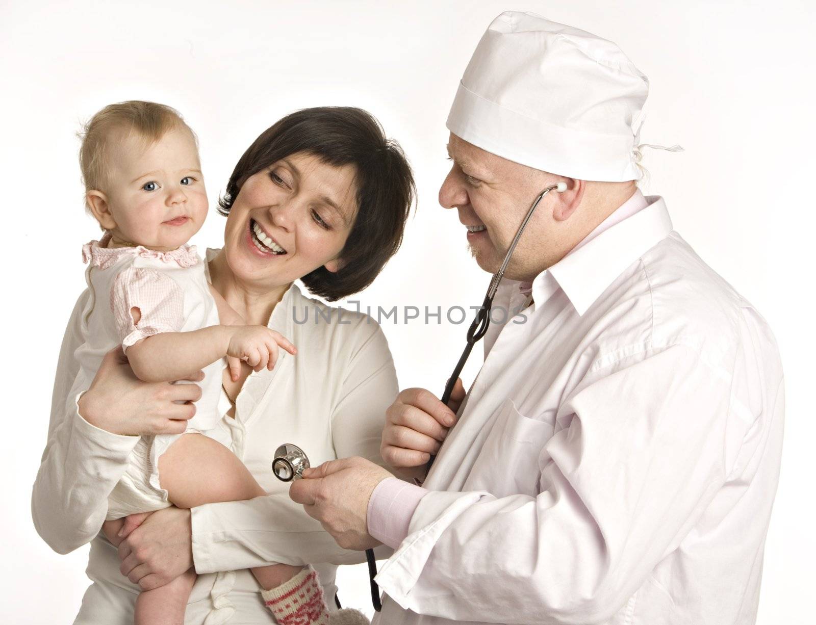 Smiling mum with the little girl on hands stands near to the doctor in white dressing gown on a white background

