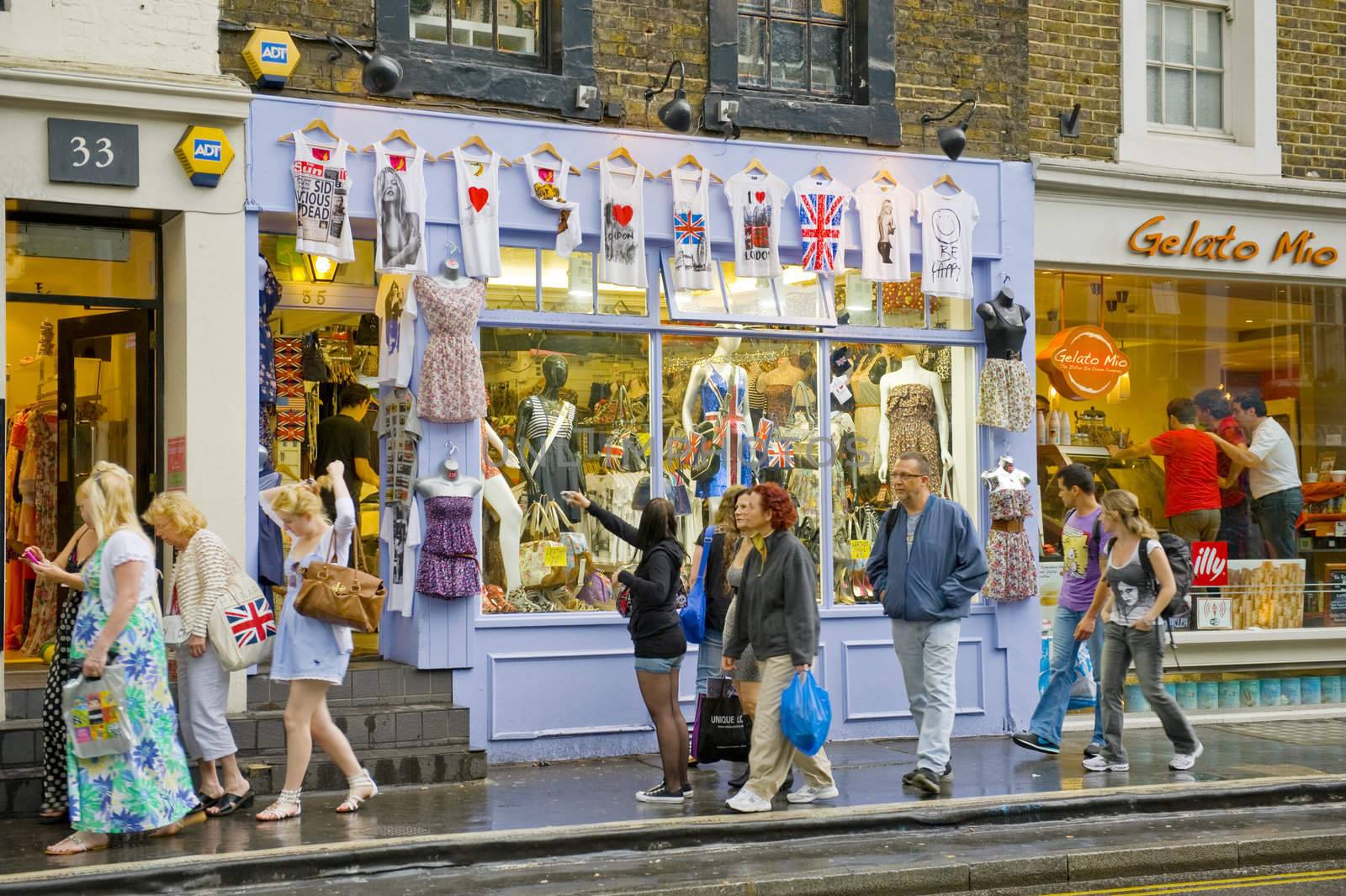 Tourists in the street London do shopping 