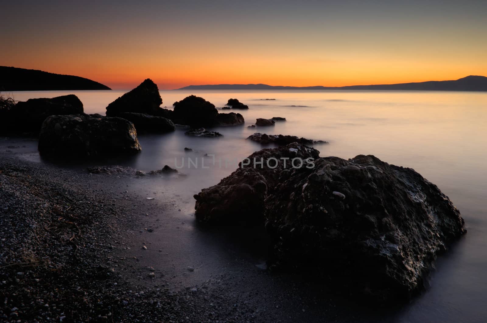 Picture of the rocky Sadova beach, in southern Greece, taken after sunset