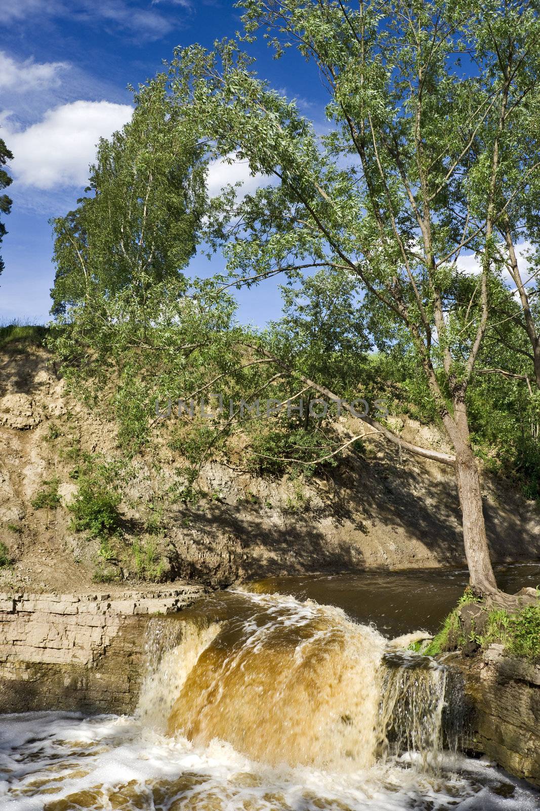 Fleeting water of a boisterous waterfall
