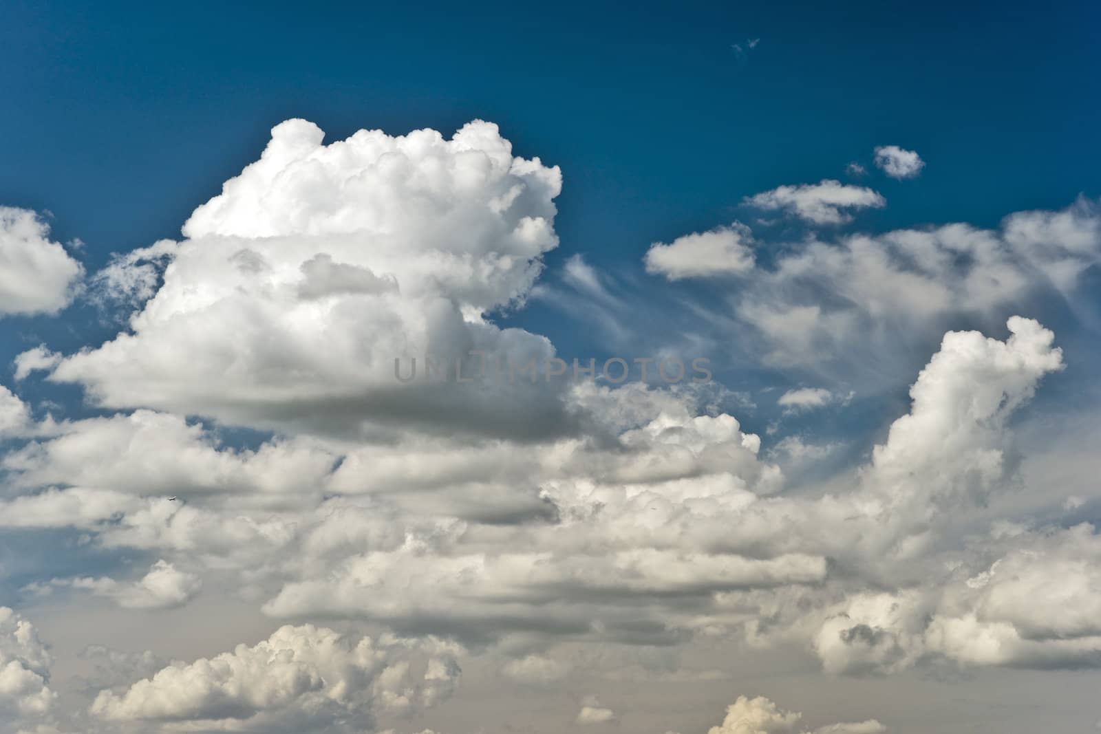 Big cumulus clouds and blue sky