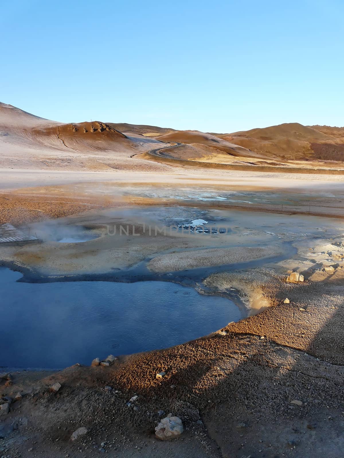 Colorful Hverir, Namafjall, near Lake Myvatn in the north of Iceland. An interesting place with mudpots, steam vents, sulphur deposits and fumaroles.