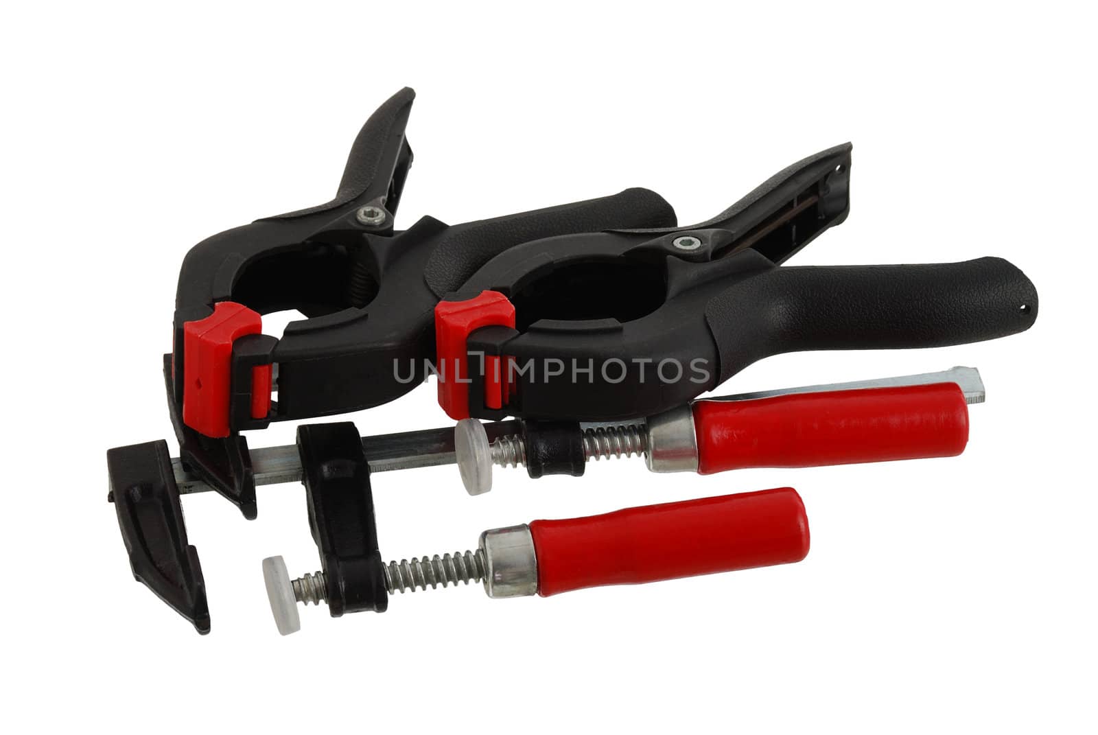 Two pairs of different clamps isolated on white background