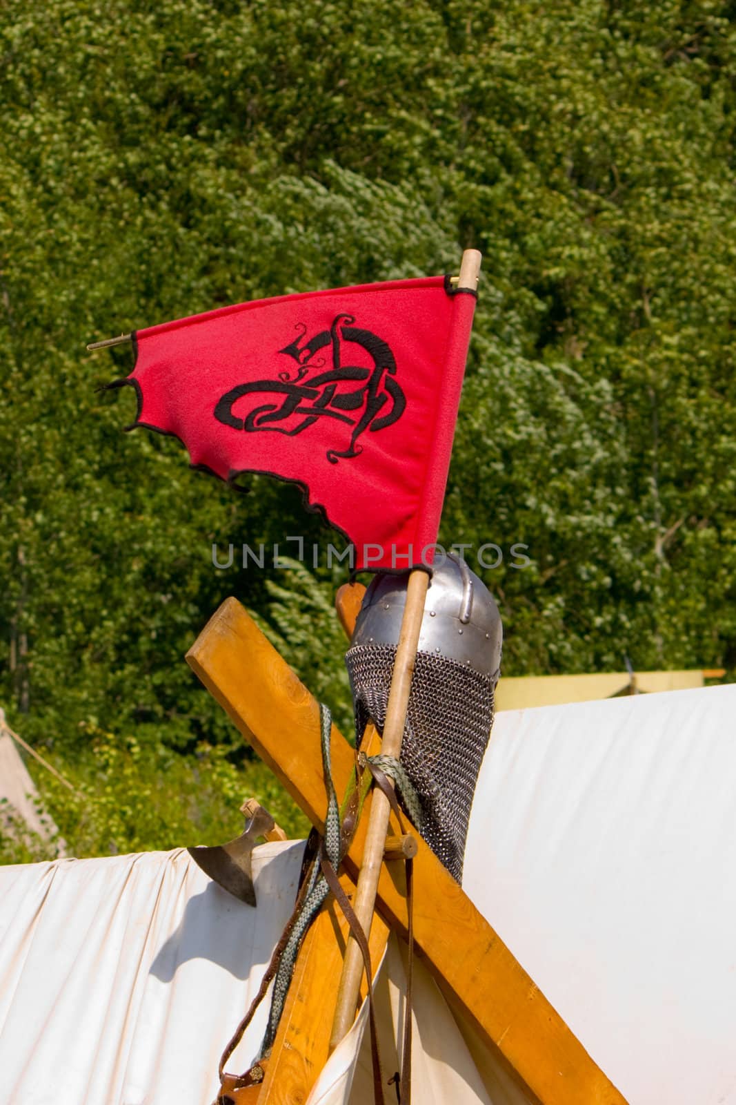 Knightly helmet and flag