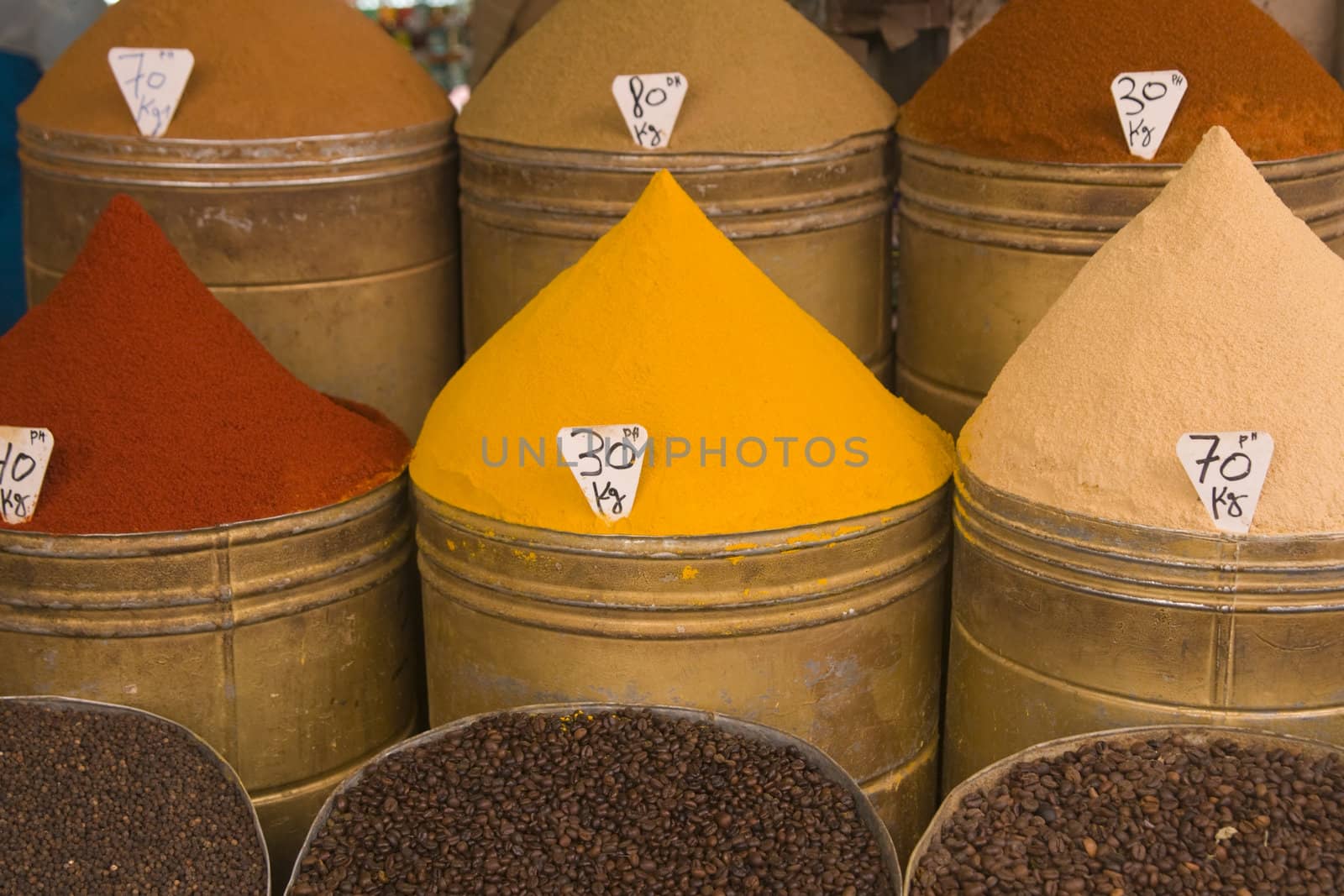 Containers of spices for sale in a shop in the historic heart of Marrakesh, Morocco