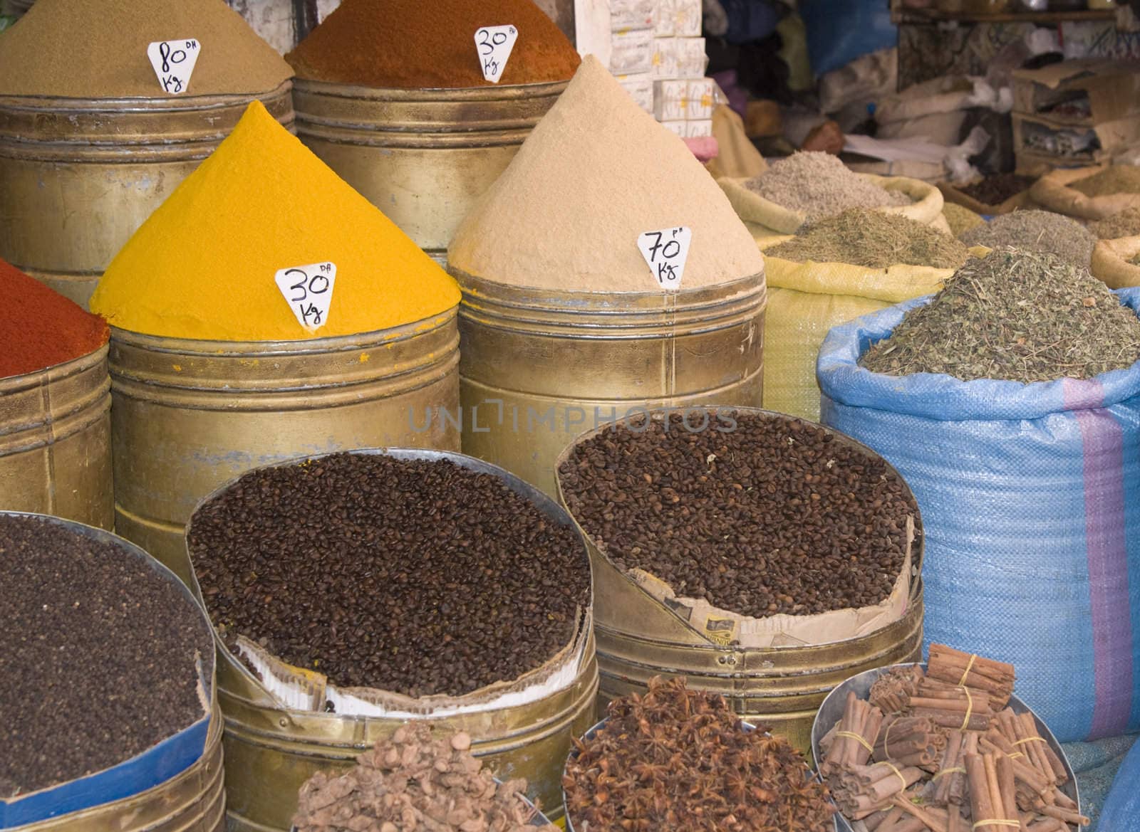 Containers of spices for sale in a shop in the historic heart of Marrakesh, Morocco