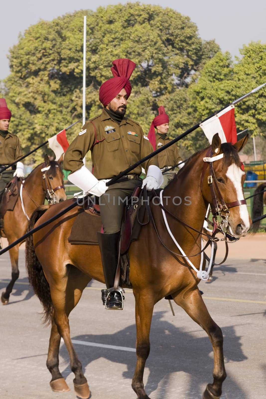 Lancer on horseback riding down the Raj Path in preparation for the Republic Day Parade, New Delhi, India