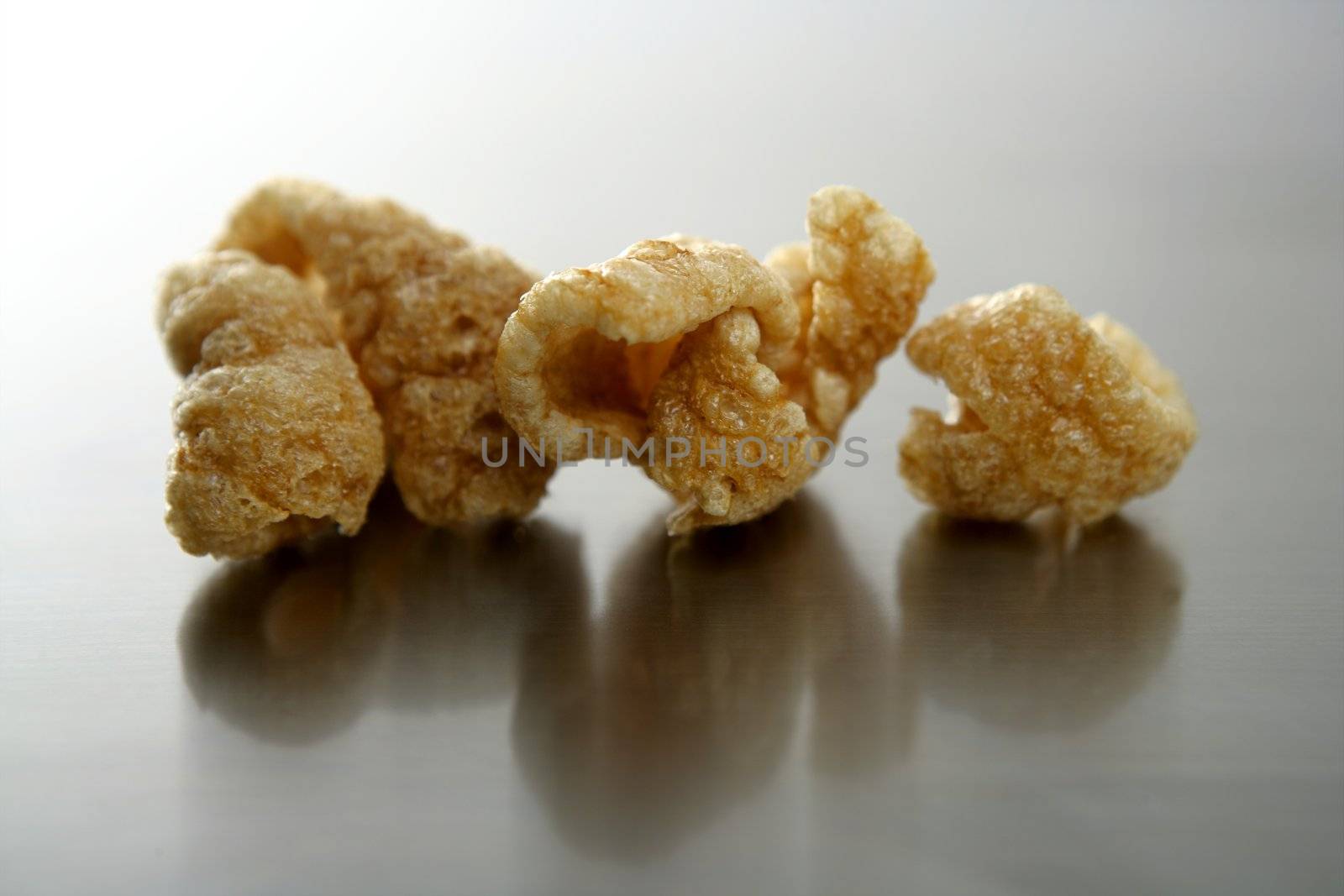 Pork rusted rinds, fat unhealthy snack apetizer