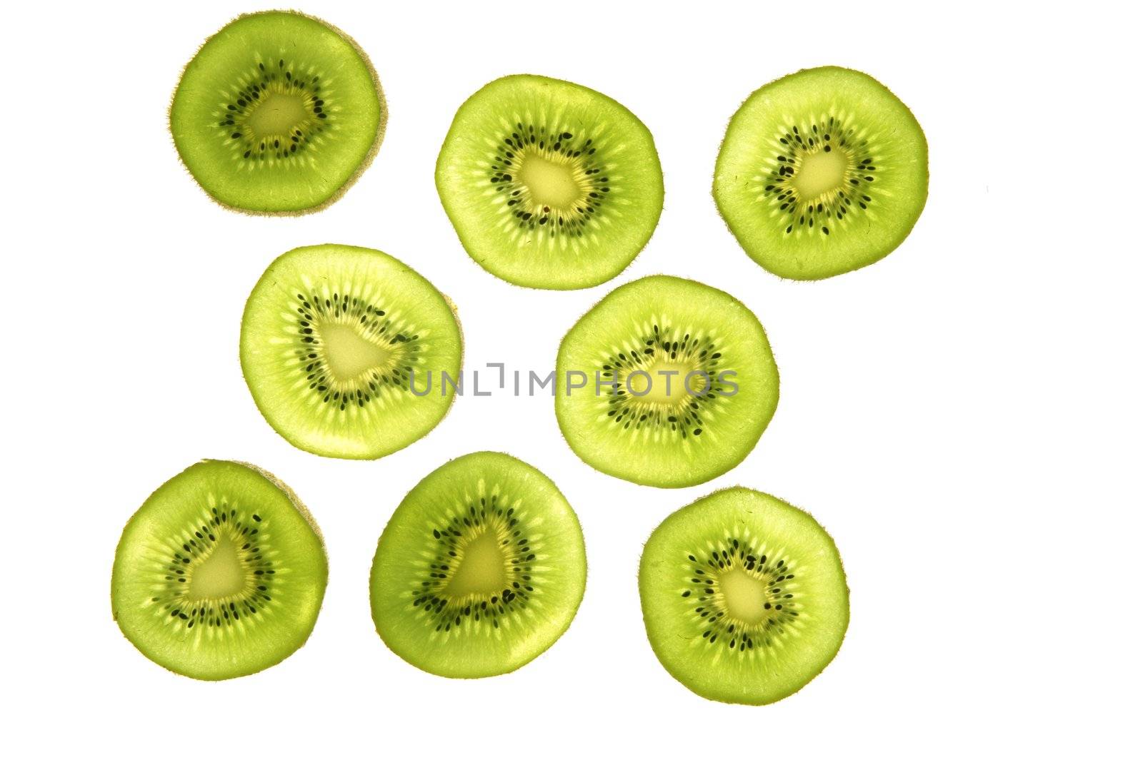 Kiwi green transparent slices over white background