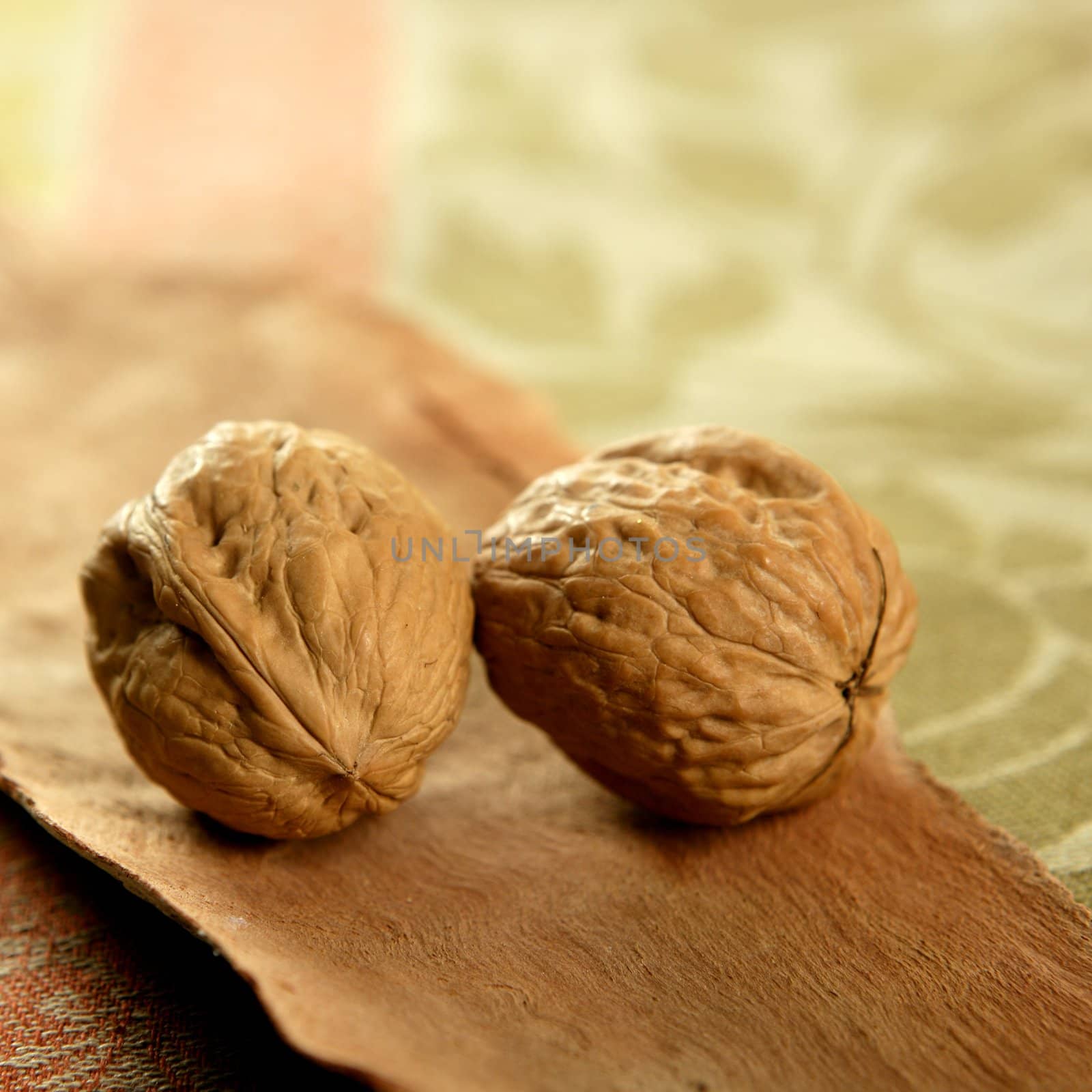 two walnut over tablecloth and wood