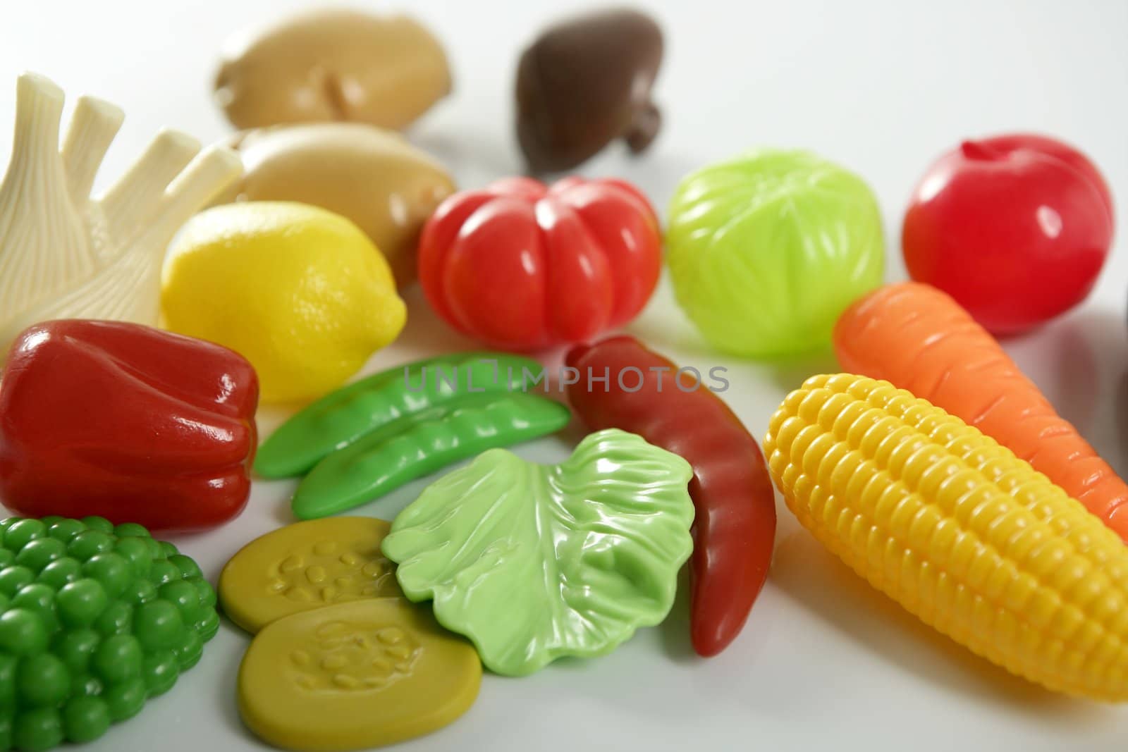Plastic game, fake varied vegetables and fruits. Children food education toy