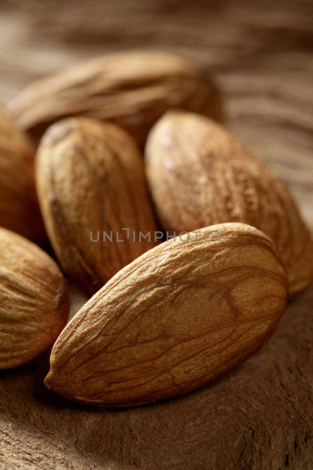 Almond macro over wood background by lunamarina