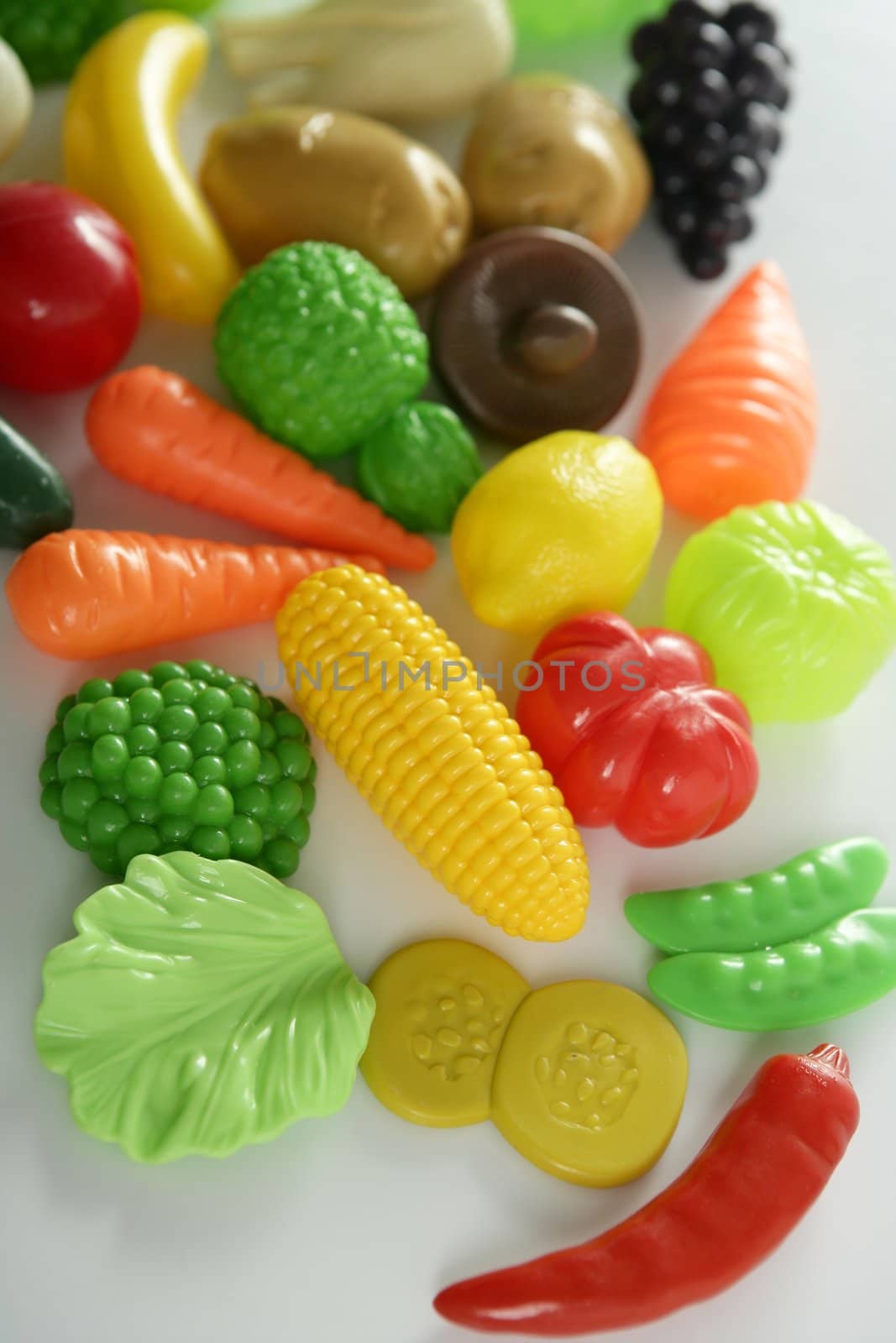 Plastic game, fake varied vegetables and fruits. Children food education toy