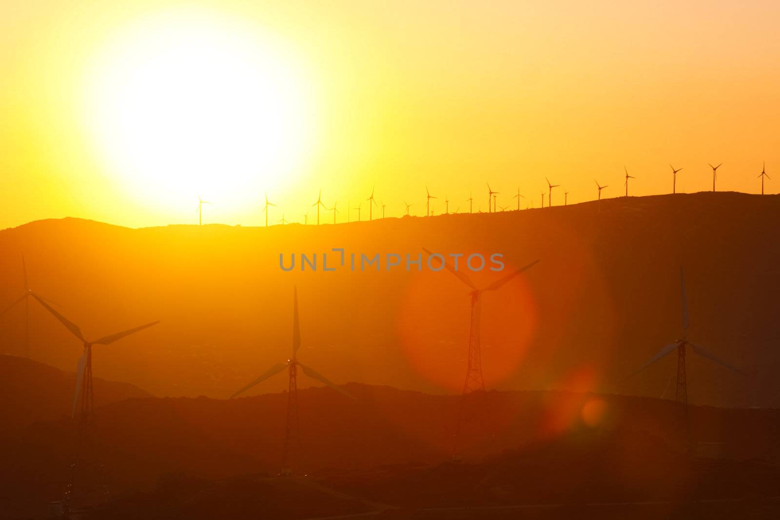 Wind farm in sunset by kasto