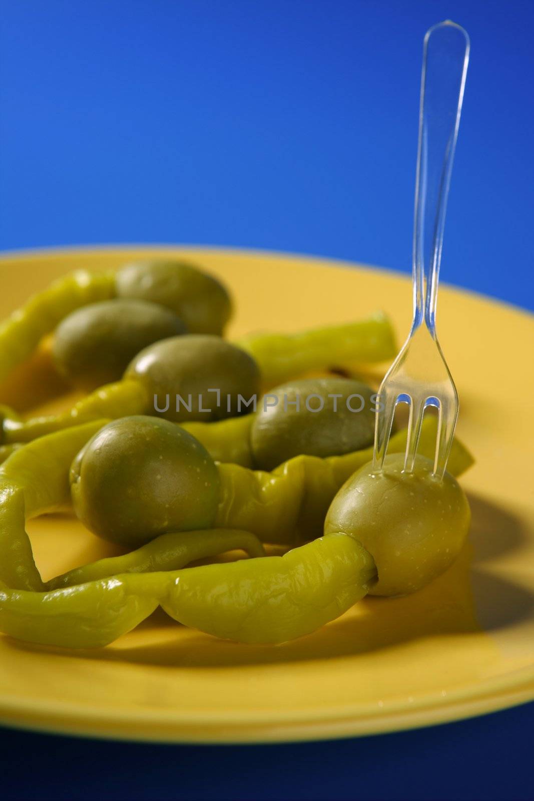 Tapas from Spain, olives and hot green pepper snack
