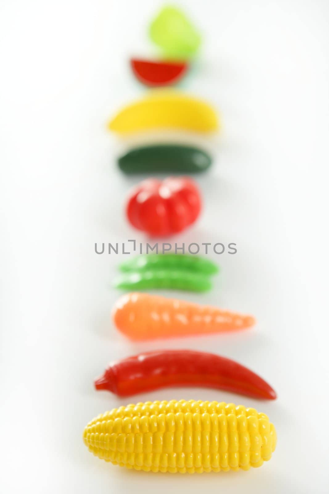 Plastic game, fake varied vegetables and fruits by lunamarina