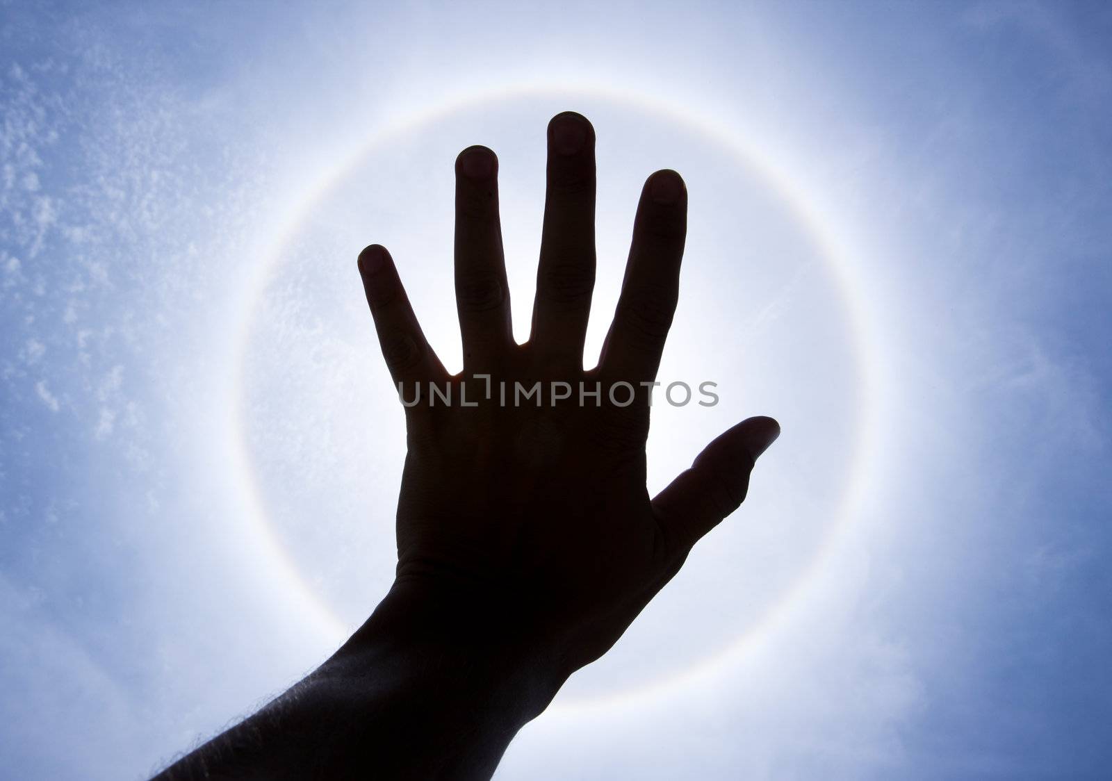 hand that shadow from Halo - sunlight  phenomenon