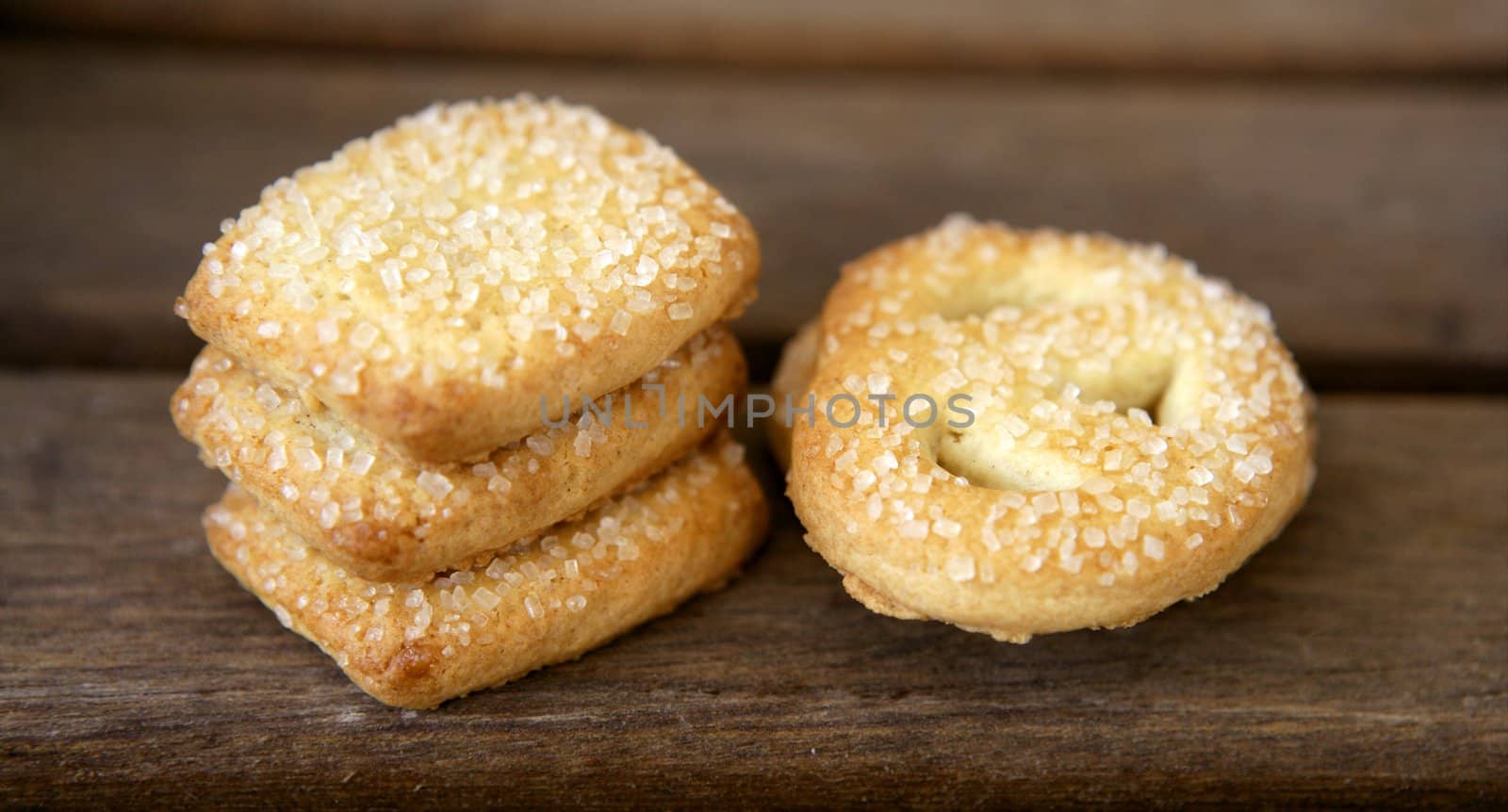 Butter cookies, holland biscuits over wood table