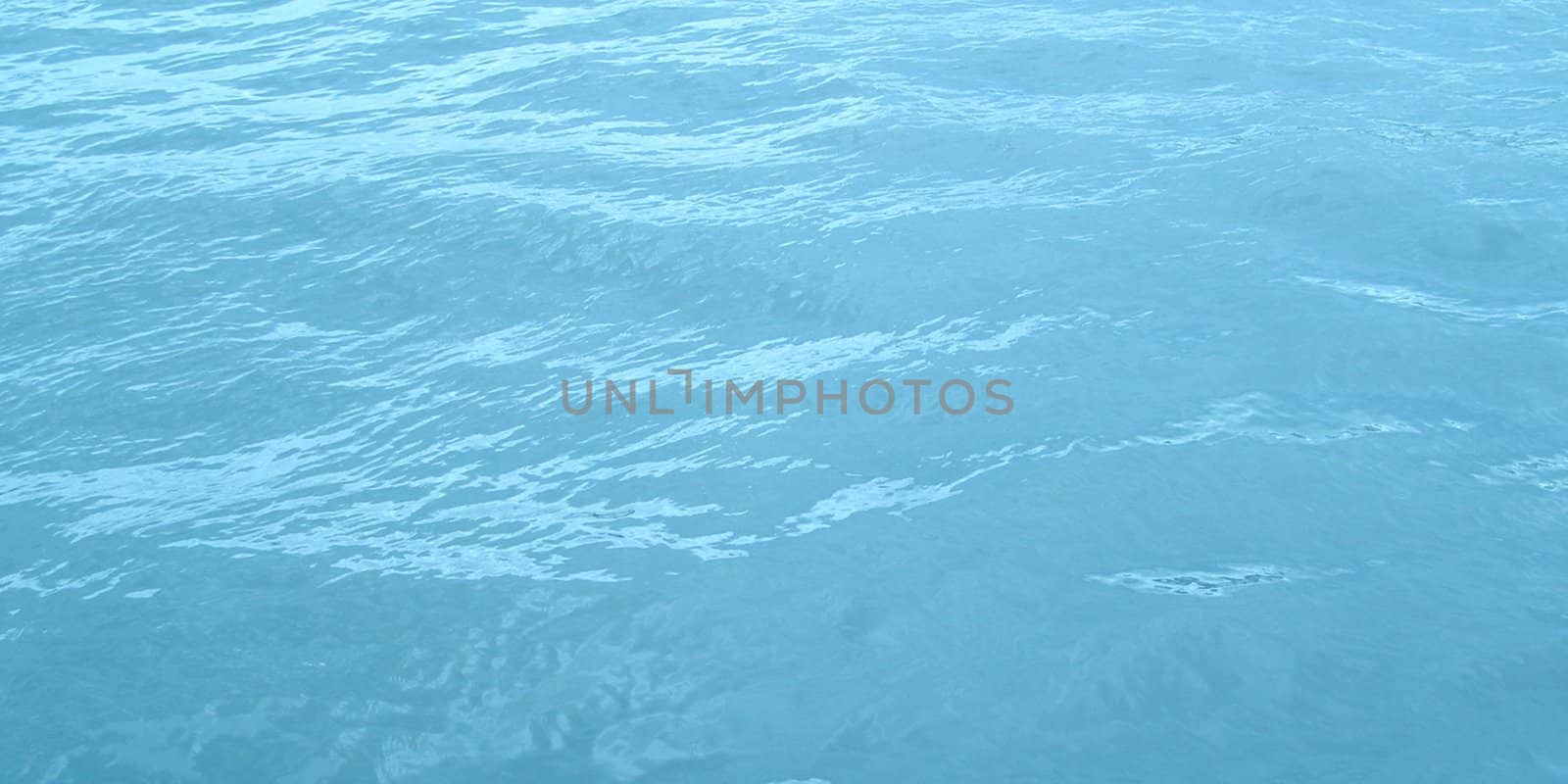 Blue sea water useful as a background