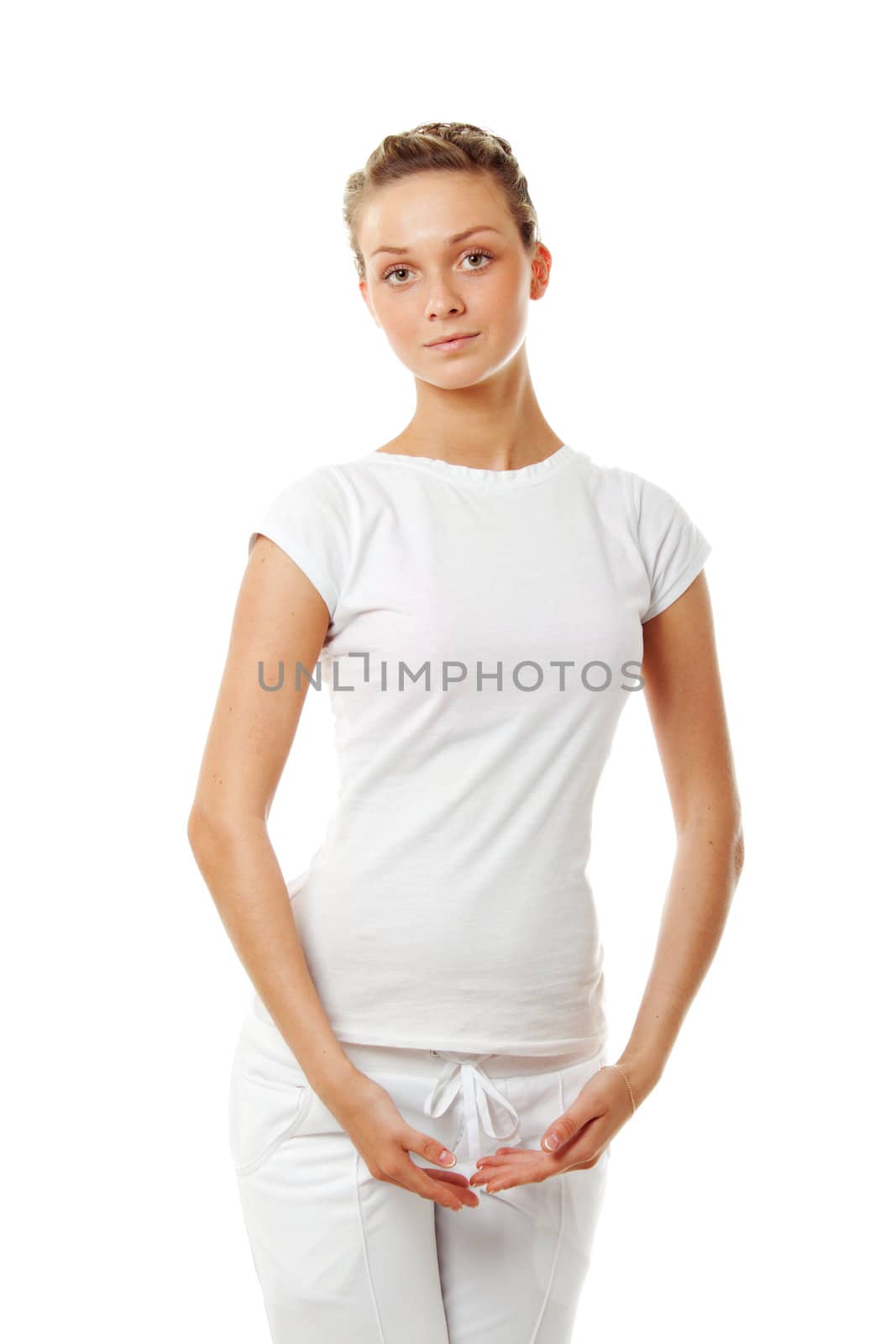 Beautiful young woman in starting pose isolated over white background