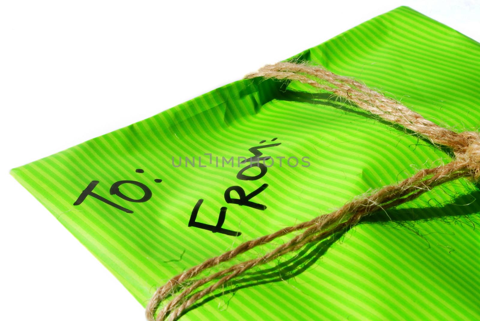 personal letter in a green tied envelop