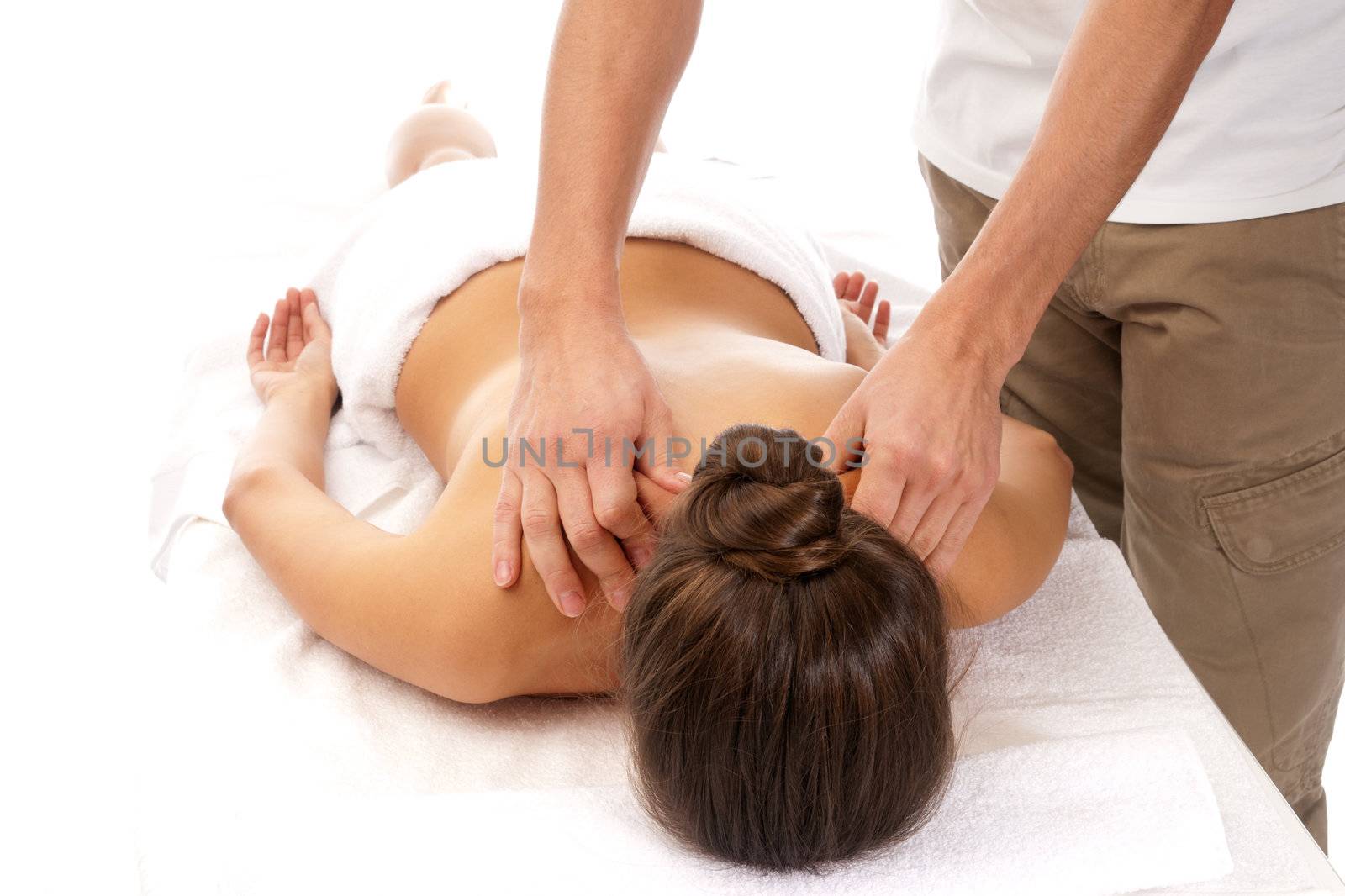 Unrecognizable woman receiving massage relax treatment close-up from male hands by dgmata
