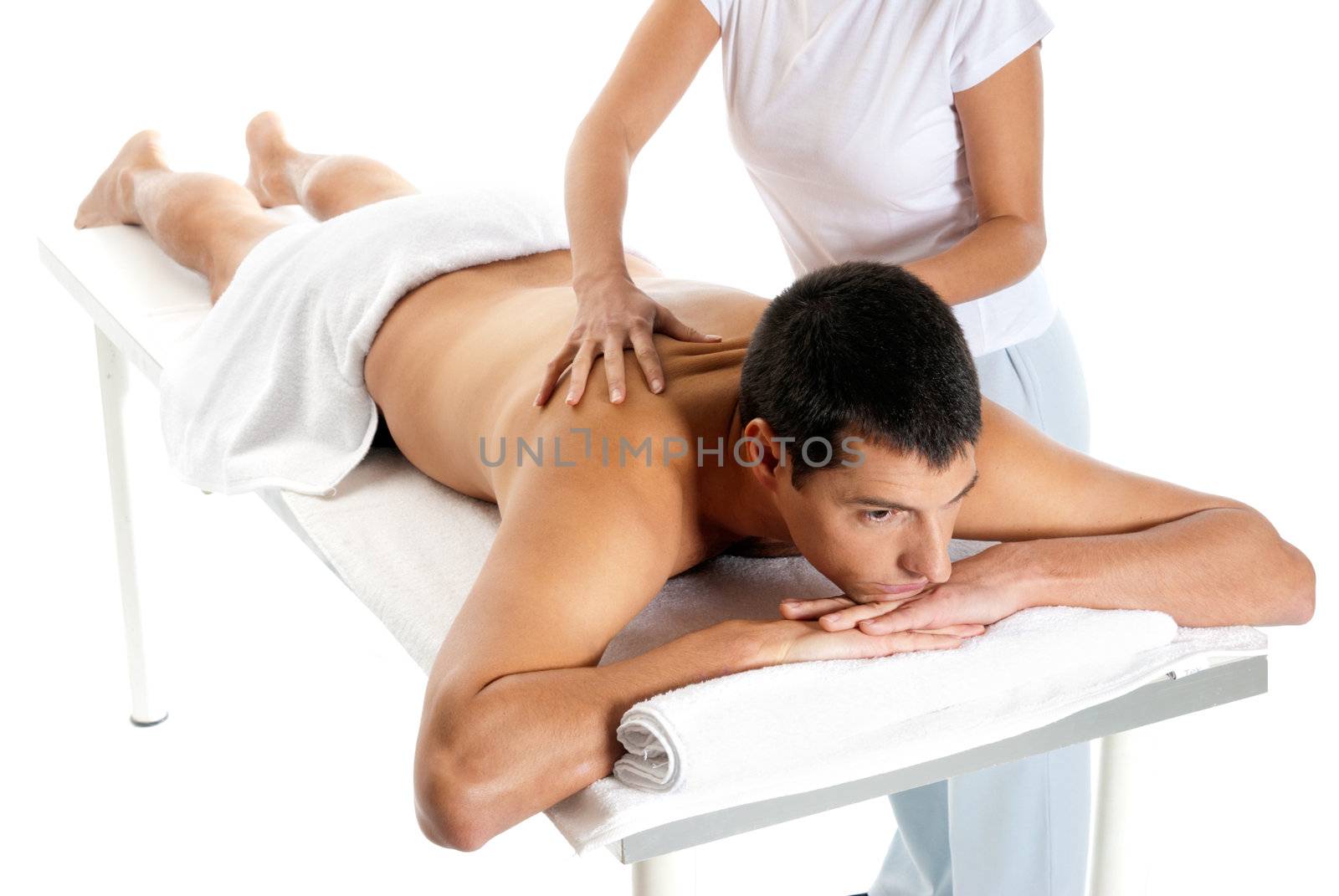 Man receiving massage relax treatment from female hands 