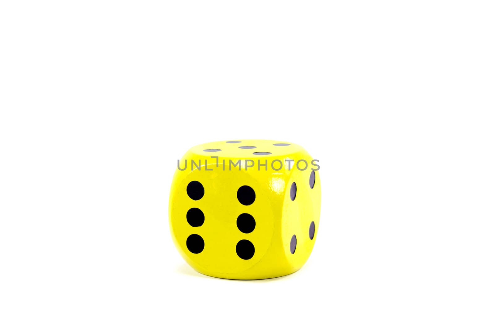 yellow die with the number six