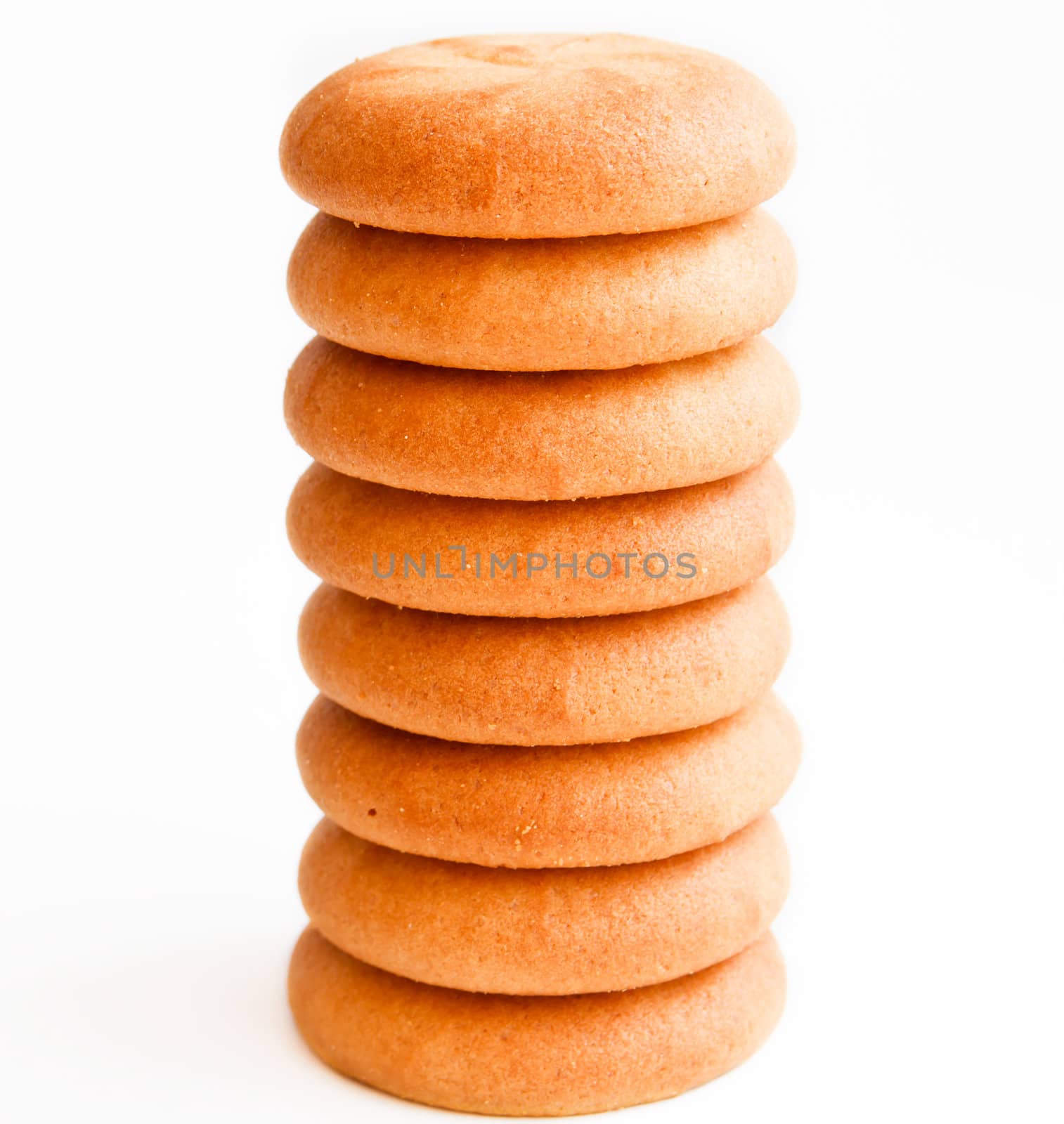 tower of chocolate biscuits isolated on white
