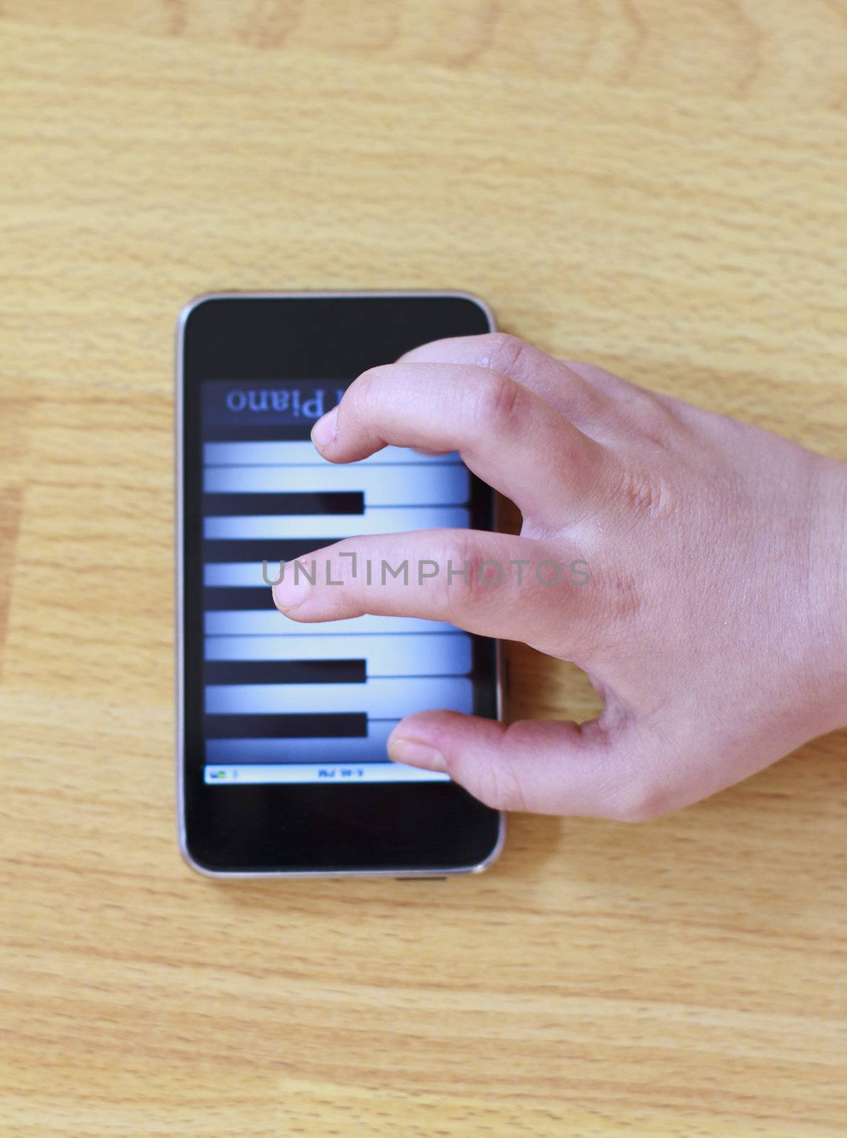 Playing piano on modern touch screen phone by manaemedia