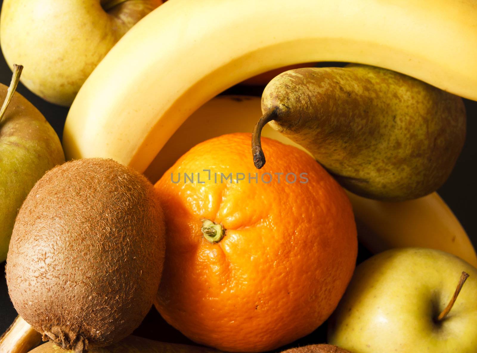 Banana, kiwi, orange, apple and pear