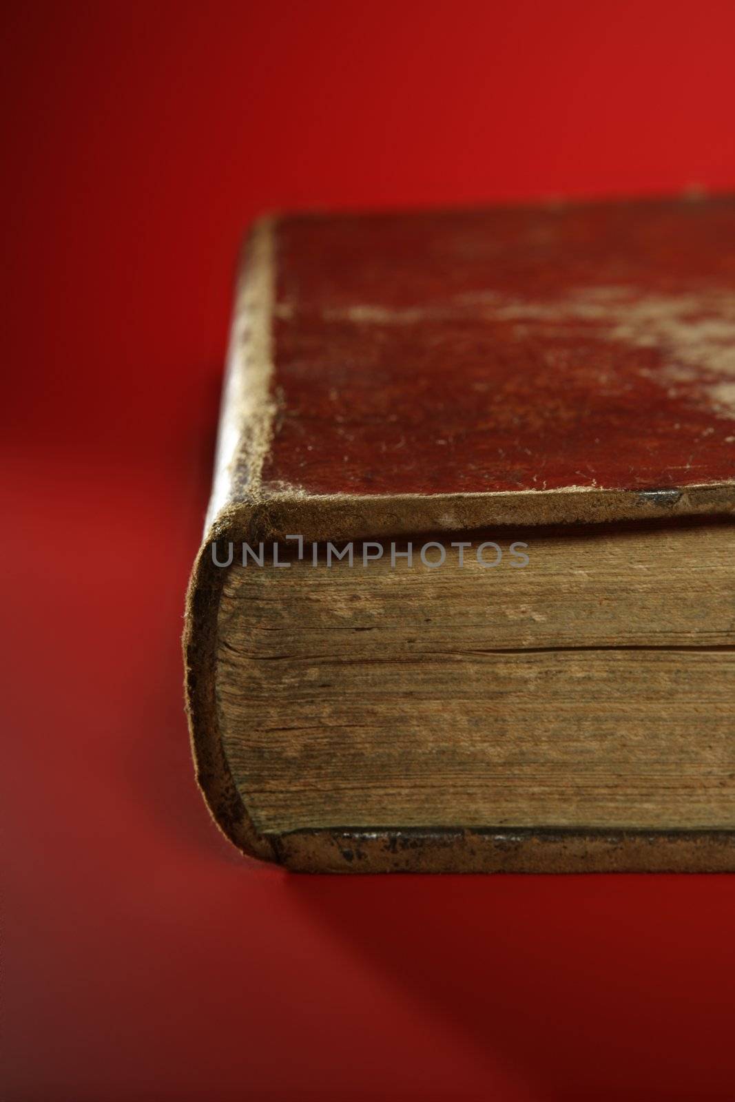 Old aged classic book close up by lunamarina