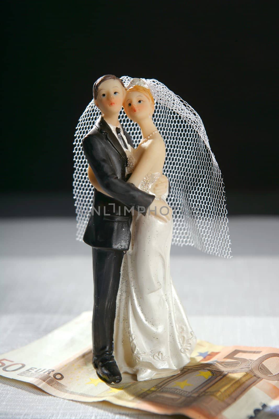 wedding couple figurine and euro note by lunamarina