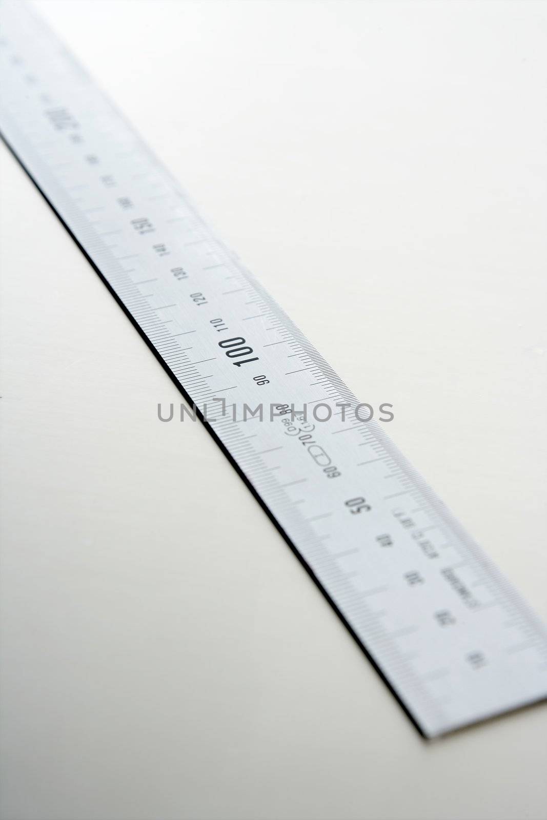 Silver aluminium metal, ruler meter on stainless steel studio backg