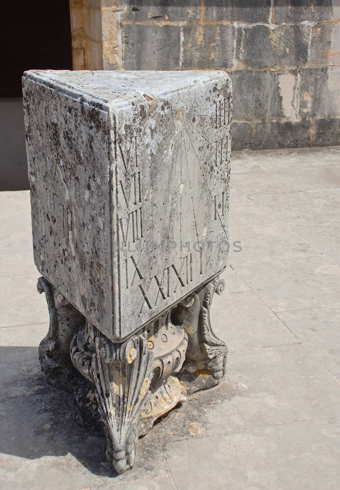 Sun dial made in the stone. Alcobaca Monastery, Portugal.