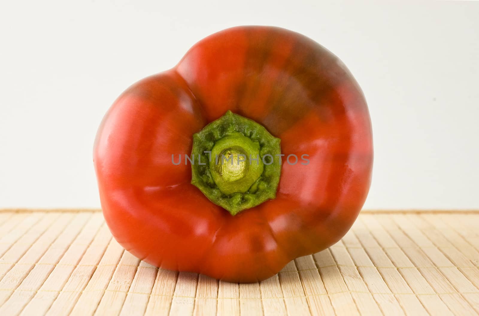 Close up of red bell pepper on table.