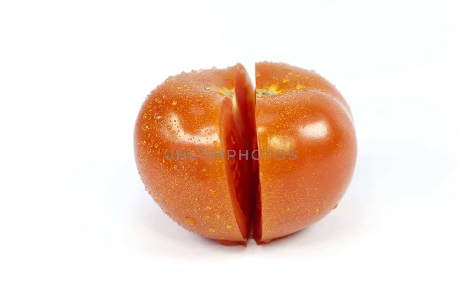 an isolated tomato on white background