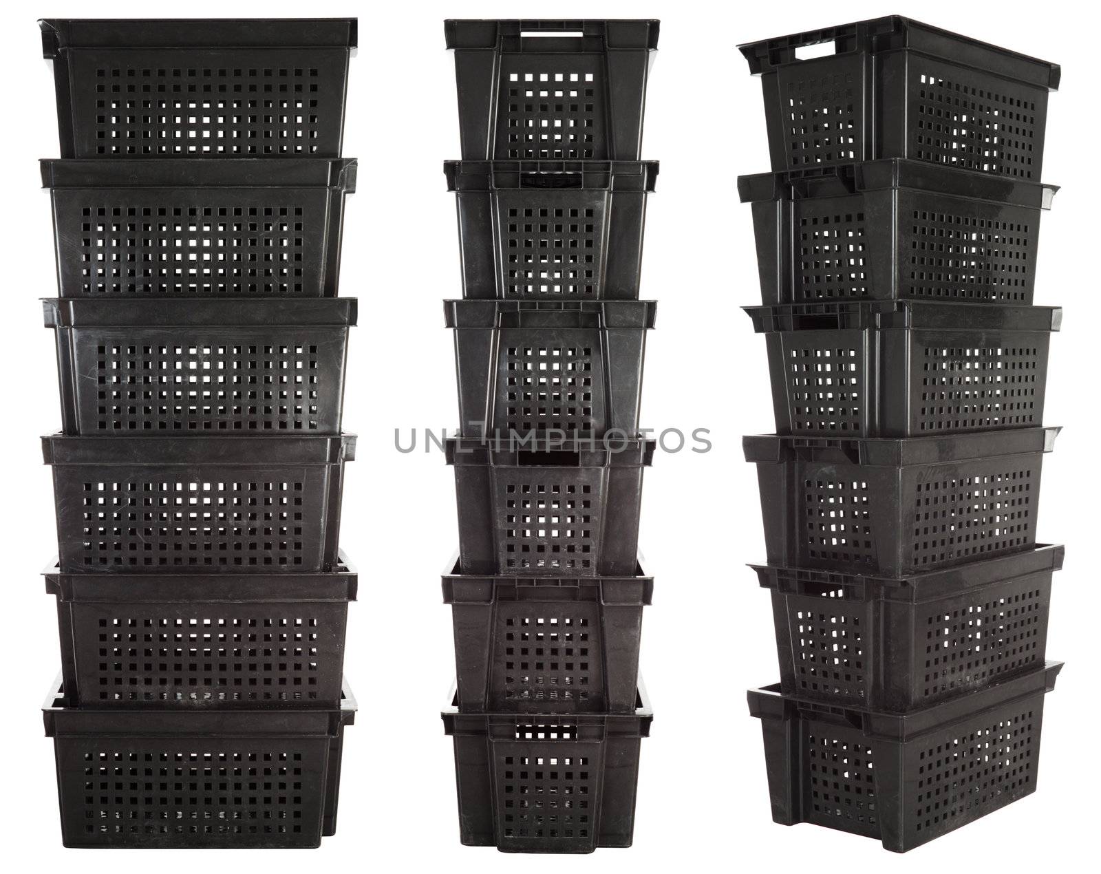 Stacks of plastic warehouse containers isolated over white background
